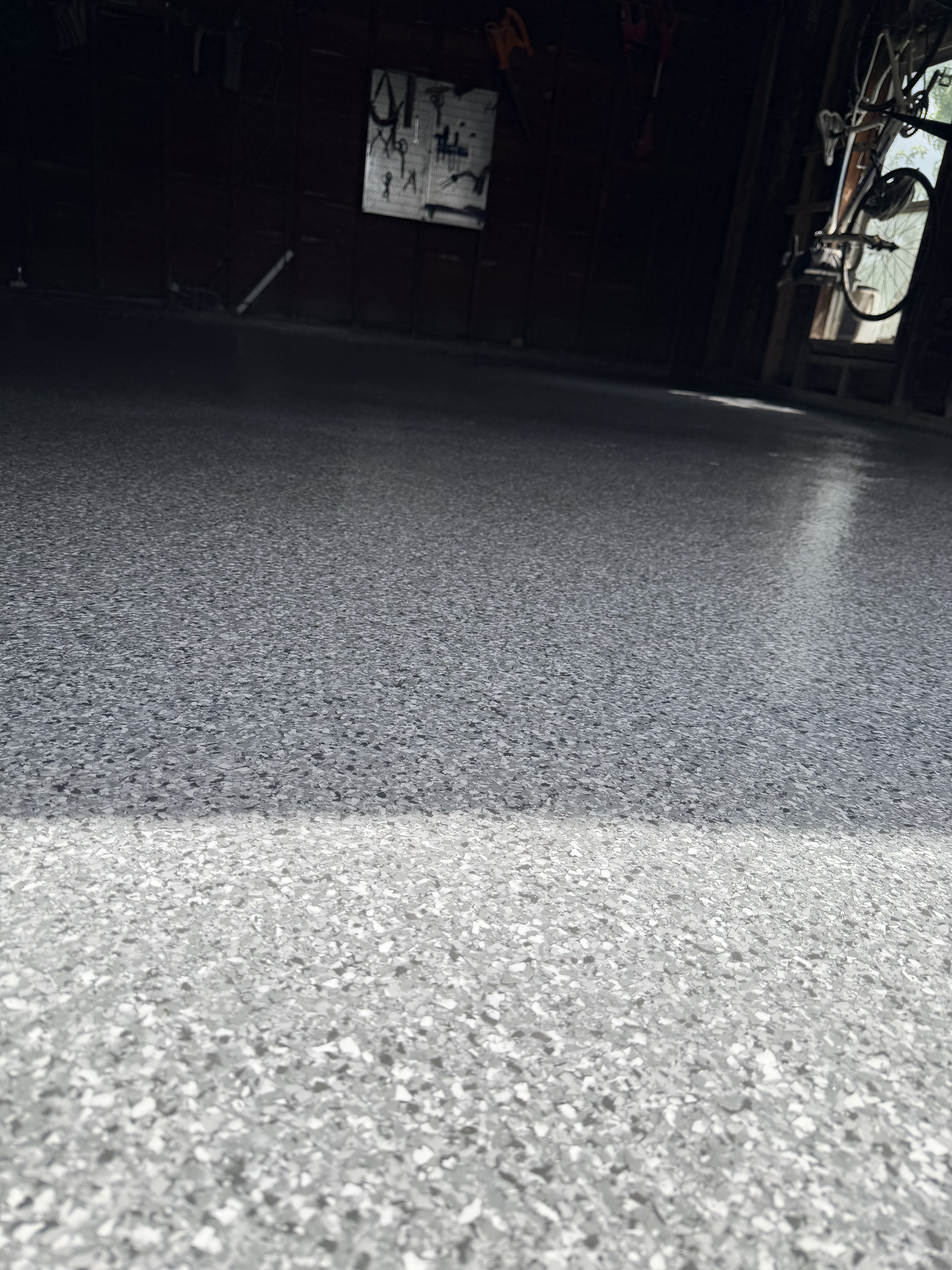 Finished polyaspartic floor coating — close-up detail
